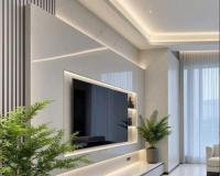 Minimalista nappali TV fallal
